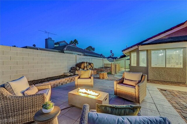 58 Pleasant Dale Dr, Henderson, NV 89074 - fenced backyard featuring a fire pit and a patio