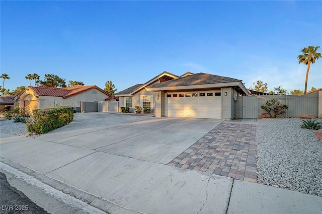 58 Pleasant Dale Dr, Henderson, NV 89074 - ranch-style home featuring a gate, an attached garage, and driveway