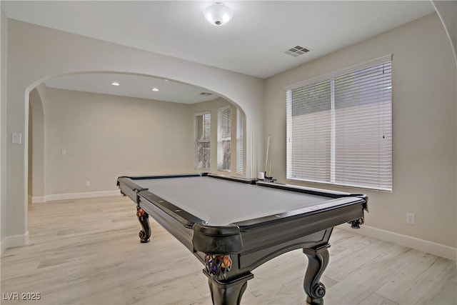 8544 Garden Valley Ct, Las Vegas, NV 89178 - recreation room with baseboards, arched walkways, light wood finished floors, and recessed lighting
