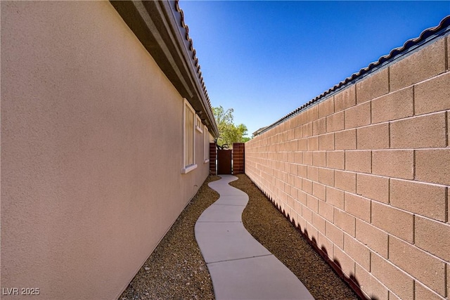 8544 Garden Valley Ct, Las Vegas, NV 89178 - view of side of property with stucco siding