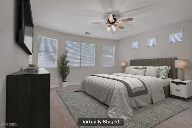 8544 Garden Valley Ct, Las Vegas, NV 89178 - carpeted bedroom with ceiling fan and baseboards