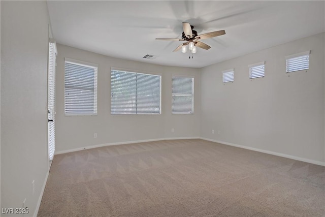 8544 Garden Valley Ct, Las Vegas, NV 89178 - unfurnished room featuring a ceiling fan, light colored carpet, and baseboards