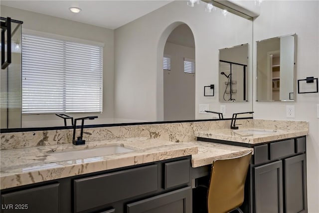 8544 Garden Valley Ct, Las Vegas, NV 89178 - bathroom with double vanity and an enclosed shower