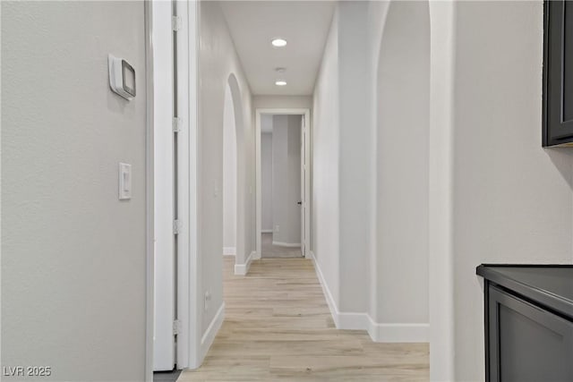 8544 Garden Valley Ct, Las Vegas, NV 89178 - corridor with light wood finished floors, baseboards, and recessed lighting