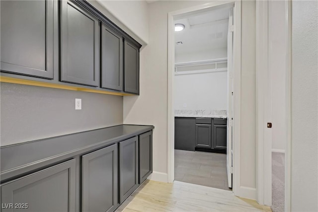 8544 Garden Valley Ct, Las Vegas, NV 89178 - hallway featuring light wood-type flooring and baseboards