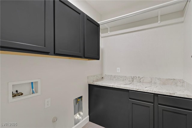 8544 Garden Valley Ct, Las Vegas, NV 89178 - laundry area with cabinet space, hookup for a washing machine, and gas dryer hookup
