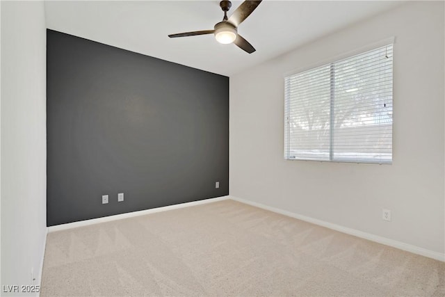 8544 Garden Valley Ct, Las Vegas, NV 89178 - spare room featuring a ceiling fan, carpet floors, and baseboards