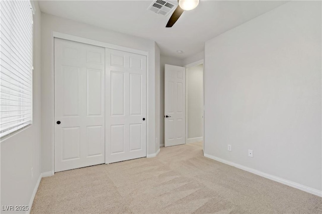 8544 Garden Valley Ct, Las Vegas, NV 89178 - unfurnished bedroom featuring carpet floors, baseboards, a closet, and ceiling fan