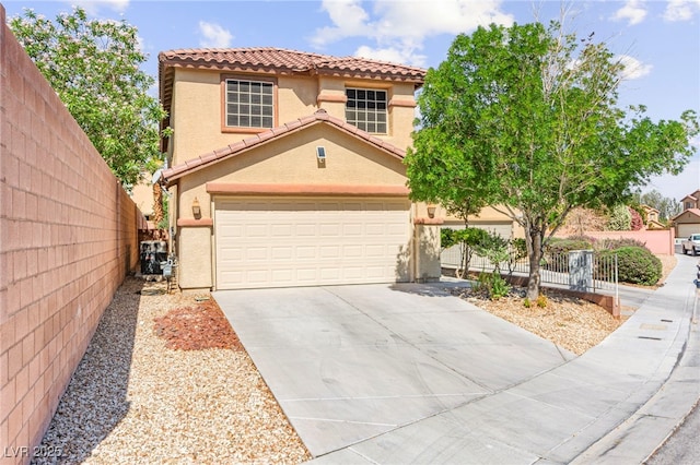 11755 Garland Grove Ln, Las Vegas, NV 89183 - mediterranean / spanish home featuring a tile roof, stucco siding, driveway, and an attached garage