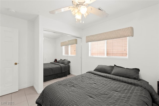 11755 Garland Grove Ln, Las Vegas, NV 89183 - tiled bedroom featuring a closet, ceiling fan, and baseboards
