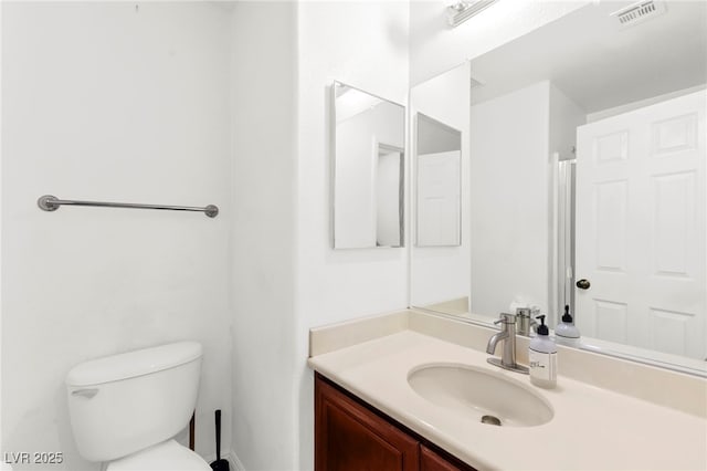 11755 Garland Grove Ln, Las Vegas, NV 89183 - bathroom featuring vanity and toilet