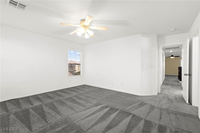 11755 Garland Grove Ln, Las Vegas, NV 89183 - unfurnished room featuring dark carpet, ceiling fan, a smoke detector, and baseboards