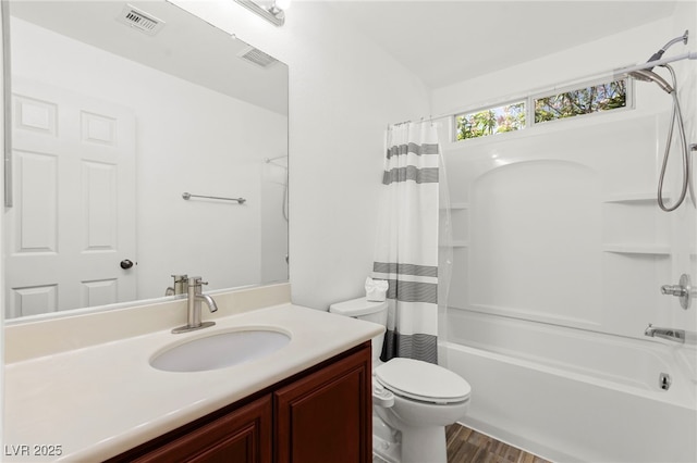 11755 Garland Grove Ln, Las Vegas, NV 89183 - bathroom featuring vanity, shower / tub combo with curtain, toilet, and wood finished floors