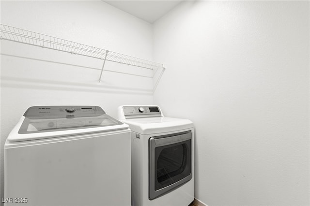 11755 Garland Grove Ln, Las Vegas, NV 89183 - laundry area with washer and clothes dryer