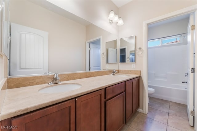 6125 Paddleboat St, North Las Vegas, NV 89031 - bathroom featuring double vanity, toilet, tile patterned flooring, and  shower combination