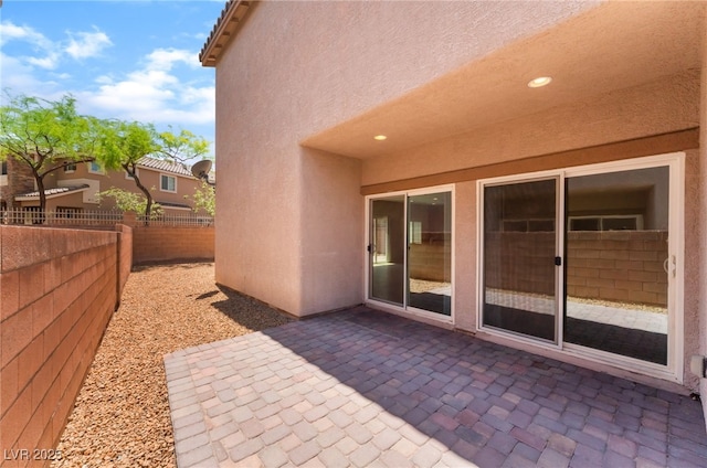 6125 Paddleboat St, North Las Vegas, NV 89031 - fenced backyard featuring a patio