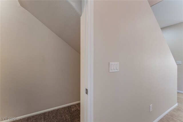 6125 Paddleboat St, North Las Vegas, NV 89031 - additional living space with baseboards and vaulted ceiling
