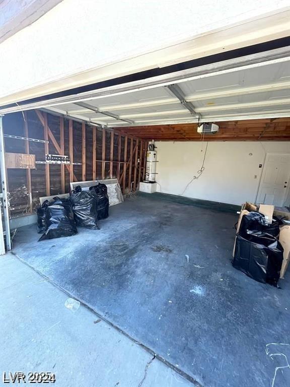 5243 Sunnywood Dr, Las Vegas, NV 89120 - garage featuring a garage door opener