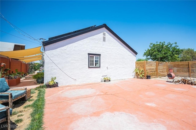 108 Verdy Ln, Las Vegas, NV 89101 - fenced backyard with a patio