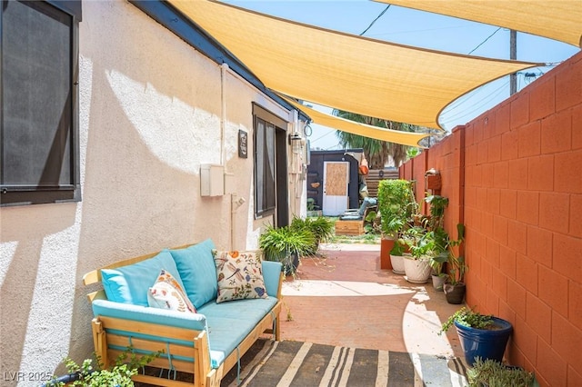 108 Verdy Ln, Las Vegas, NV 89101 - fenced backyard featuring a patio area and an outdoor living space