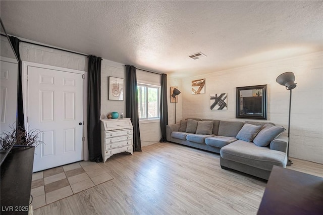 108 Verdy Ln, Las Vegas, NV 89101 - living area featuring a textured ceiling