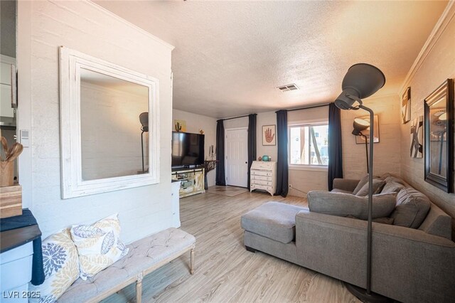 108 Verdy Ln, Las Vegas, NV 89101 - living room featuring wood finished floors and a textured ceiling