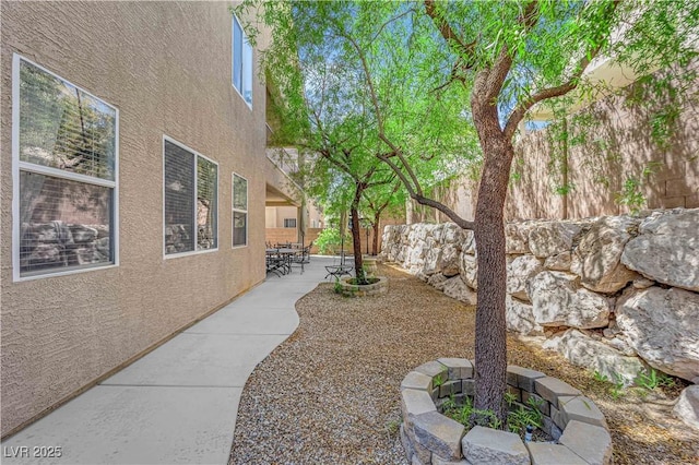 6739 Quapaw St, Las Vegas, NV 89149 - view of yard featuring a patio area