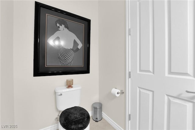 6739 Quapaw St, Las Vegas, NV 89149 - bathroom featuring baseboards, toilet, and tile patterned floors