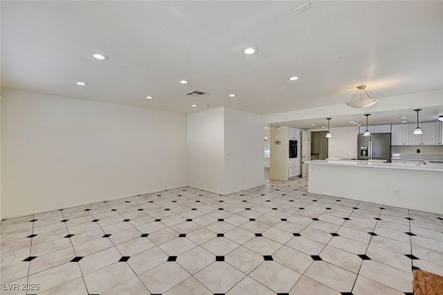 2917 Broken Willow Cir, Las Vegas, NV 89117 - unfurnished living room with recessed lighting, light floors, and baseboards