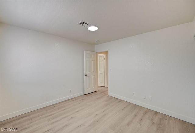 2917 Broken Willow Cir, Las Vegas, NV 89117 - unfurnished room featuring light wood-type flooring and baseboards