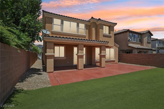 11707 Longworth Rd, Las Vegas, NV 89135 - back of house featuring a tiled roof, stucco siding, and a patio