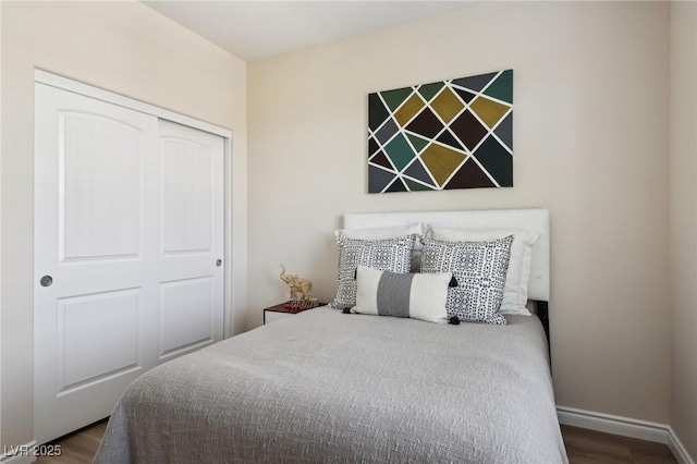 11707 Longworth Rd, Las Vegas, NV 89135 - bedroom featuring dark wood finished floors, a closet, and baseboards