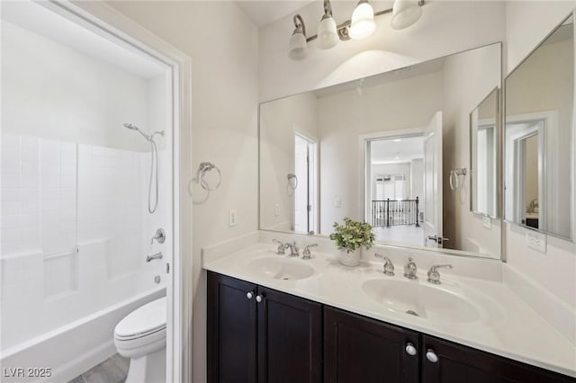 11707 Longworth Rd, Las Vegas, NV 89135 - bathroom featuring double vanity, toilet, and shower / washtub combination
