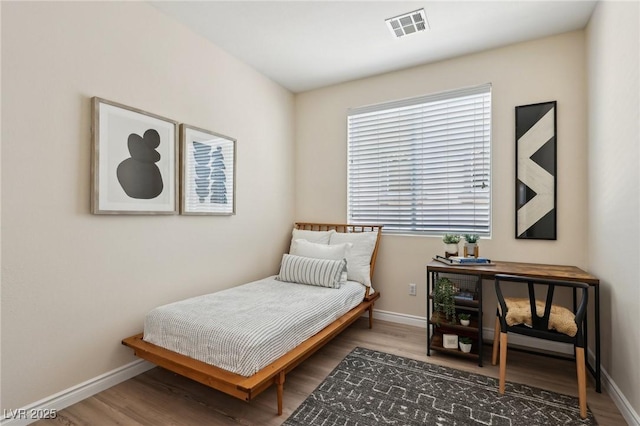 11707 Longworth Rd, Las Vegas, NV 89135 - bedroom featuring wood finished floors and baseboards