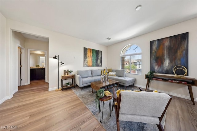 11707 Longworth Rd, Las Vegas, NV 89135 - living room featuring light wood-style floors and baseboards
