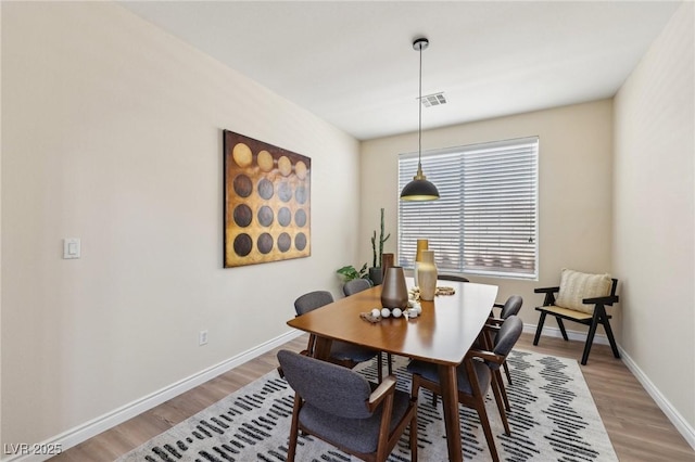 11707 Longworth Rd, Las Vegas, NV 89135 - dining area with light wood-type flooring and baseboards
