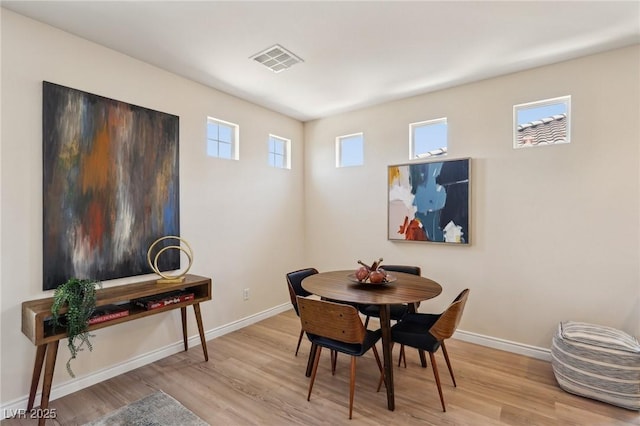 11707 Longworth Rd, Las Vegas, NV 89135 - dining area with light wood-style flooring and baseboards