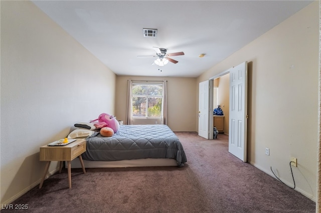 3950 S Sandhill Rd Unit 130, Las Vegas, NV 89121 - bedroom featuring carpet flooring, baseboards, and ceiling fan