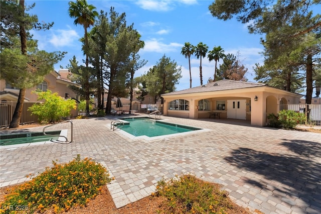 3950 S Sandhill Rd Unit 130, Las Vegas, NV 89121 - community pool with a patio