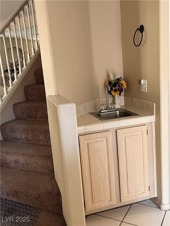 3950 S Sandhill Rd Unit 130, Las Vegas, NV 89121 - bar area with stairway and light tile patterned flooring