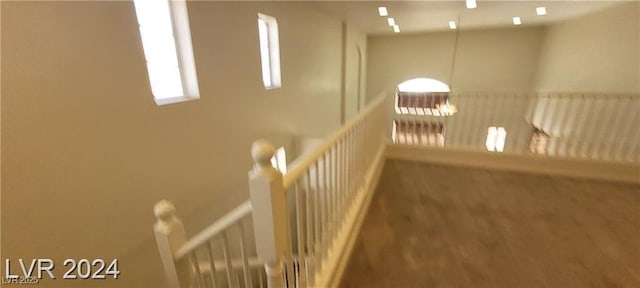 4821 Whisper Lake Ave, Las Vegas, NV 89131 - hall featuring carpet flooring and an upstairs landing