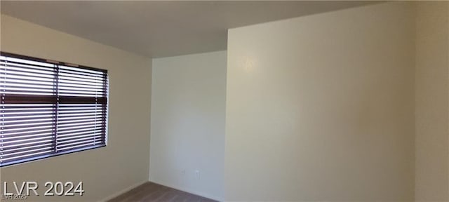 4821 Whisper Lake Ave, Las Vegas, NV 89131 - empty room featuring healthy amount of natural light and wood finished floors