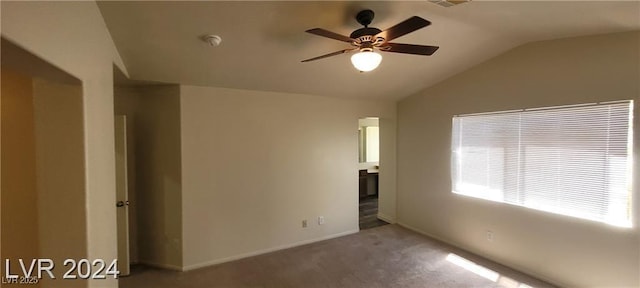 4821 Whisper Lake Ave, Las Vegas, NV 89131 - carpeted empty room featuring lofted ceiling, ceiling fan, baseboards, and a smoke detector