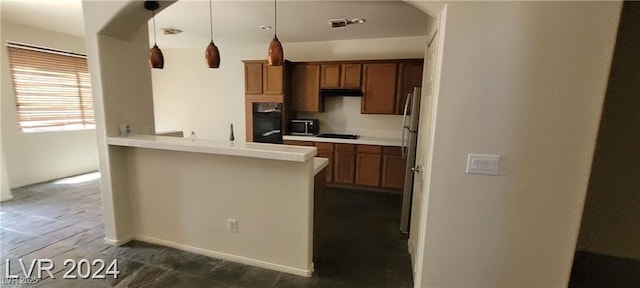 4821 Whisper Lake Ave, Las Vegas, NV 89131 - kitchen featuring a peninsula, black appliances, brown cabinets, light countertops, and pendant lighting