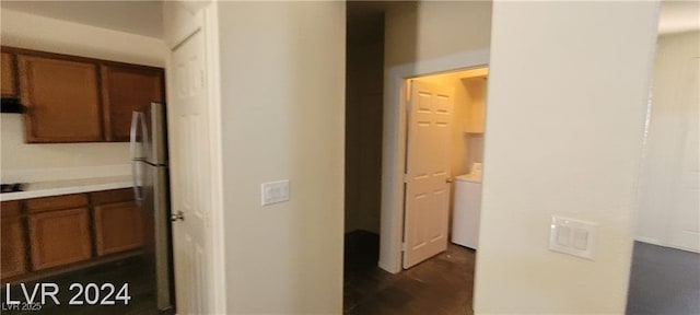 4821 Whisper Lake Ave, Las Vegas, NV 89131 - kitchen with brown cabinets, freestanding refrigerator, and light countertops