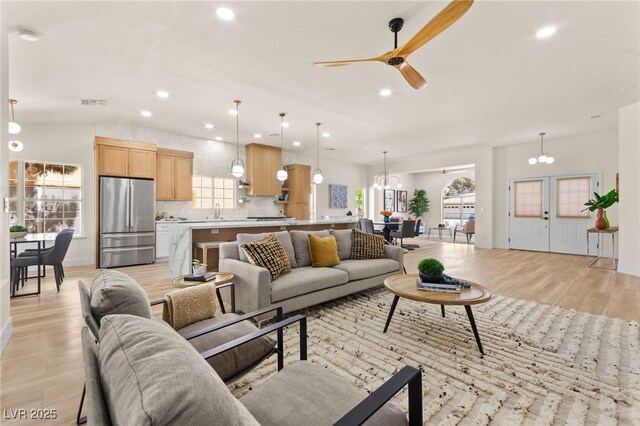 5157 Future Dr, Las Vegas, NV 89130 - living area featuring light wood-style floors, a chandelier, a ceiling fan, recessed lighting, and baseboards