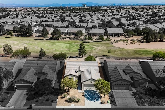3405 Kingbird Dr, North Las Vegas, NV 89084 - aerial view of residential area featuring a mountain backdrop and a golf course