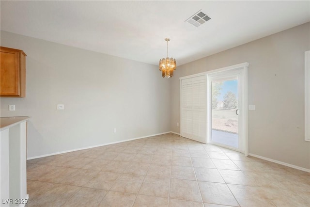 3405 Kingbird Dr, North Las Vegas, NV 89084 - unfurnished dining area with a chandelier, baseboards, and light tile patterned floors