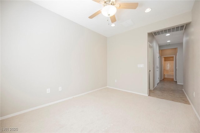 3405 Kingbird Dr, North Las Vegas, NV 89084 - spare room with light colored carpet, baseboards, recessed lighting, and ceiling fan