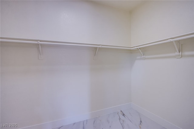 5653 Artesia Lake Ct, Las Vegas, NV 89118 - spacious closet featuring marble finish flooring